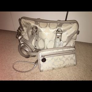Silver Coach handle with cross body
